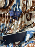 Resale Brands Skies Are Blue Pleated Maxi Skirt in Blue and Brown Floral Print